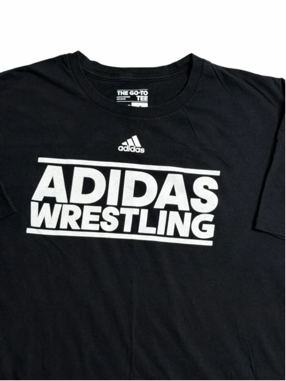 Men’s Adidas Wrestling graphic t-shirt featuring a bold white Adidas Wrestling l